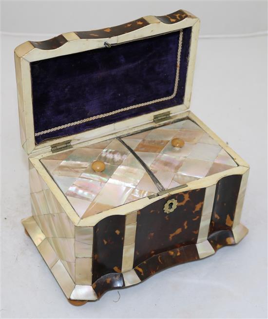 An early Victorian mother of pearl and tortoiseshell tea caddy, 8in.